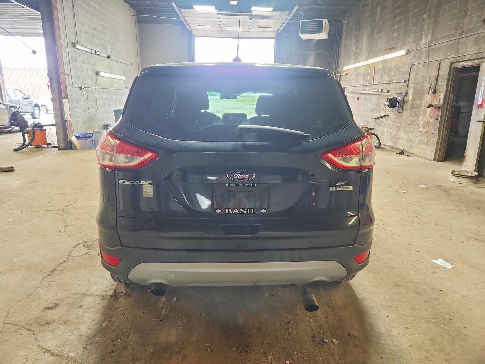 Photo 6 from auction – 2014 FORD ESCAPE with VIN 1FMCU0GX3EUB13571