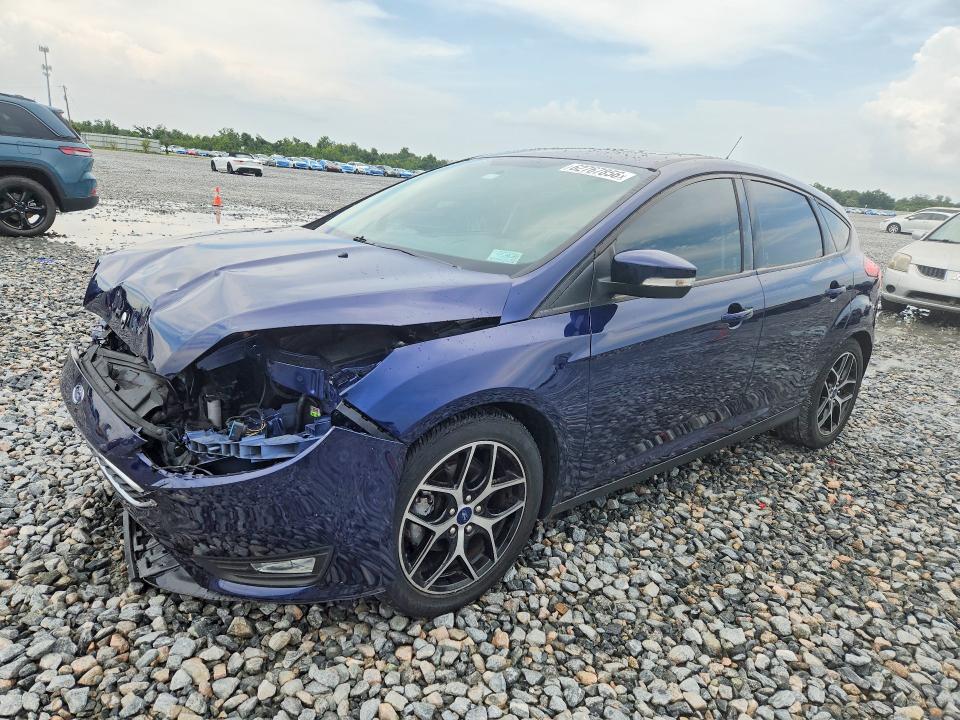FORD FOCUS 2017 with VIN 1FADP3M26HL306422 - Photo from auction