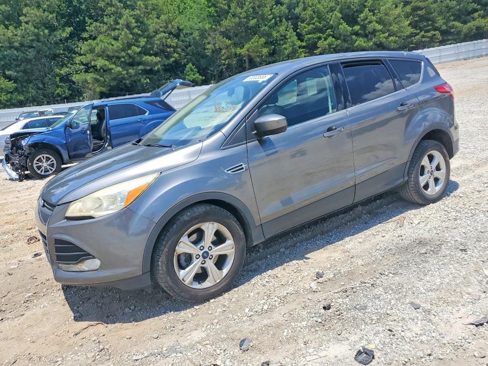FORD ESCAPE 2014 with VIN 1FMCU0GX1EUD18516 - Photo from auction