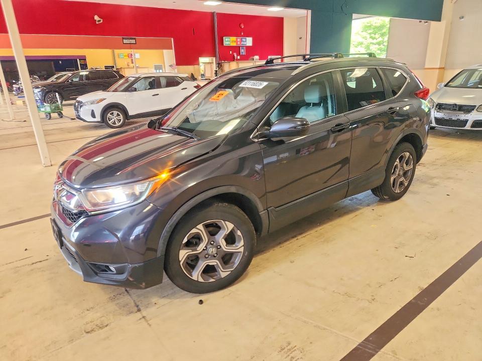 Photo 1 from auction – 2018 HONDA CR-V with VIN 7FARW2H84JE081667