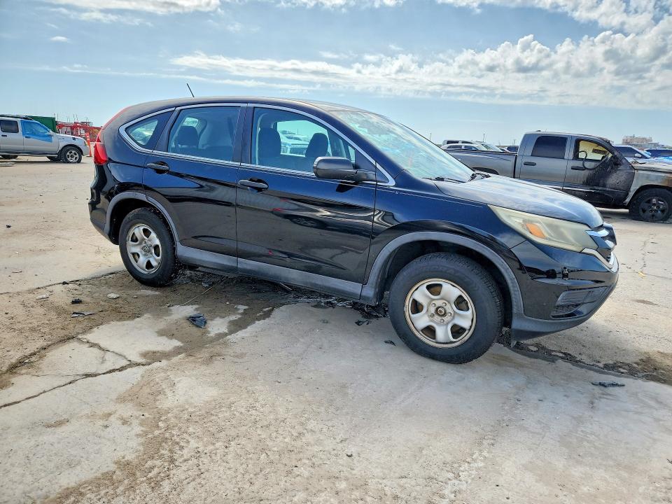 Photo 4 from auction – 2015 HONDA CR-V with VIN 3CZRM3H31FG703424