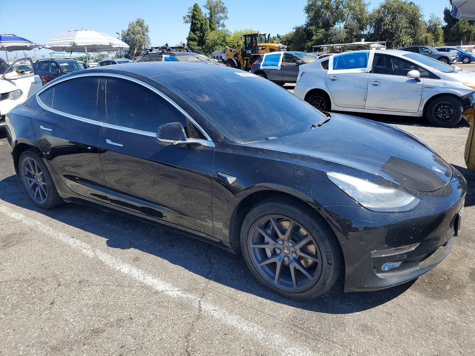 Photo 4 from auction – 2018 TESLA MODEL 3 with VIN 5YJ3E1EA2JF123307