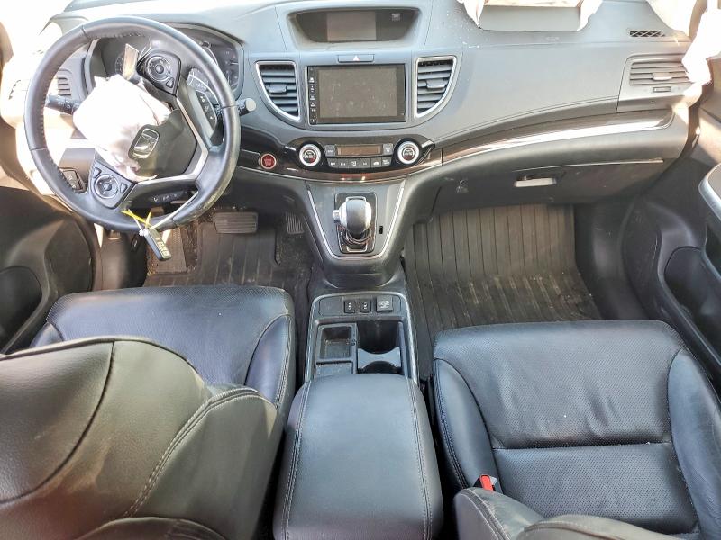 Photo 8 from auction – 2016 HONDA CR-V with VIN 5J6RM4H90GL133995