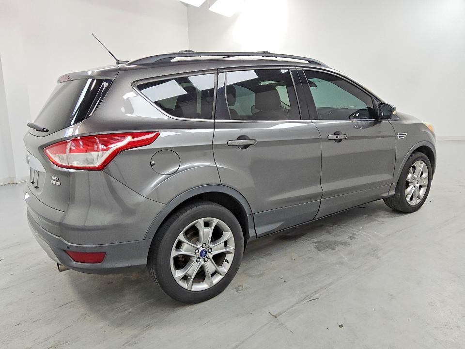 Photo 3 from auction – 2013 FORD ESCAPE with VIN 1FMCU9HX4DUB12057