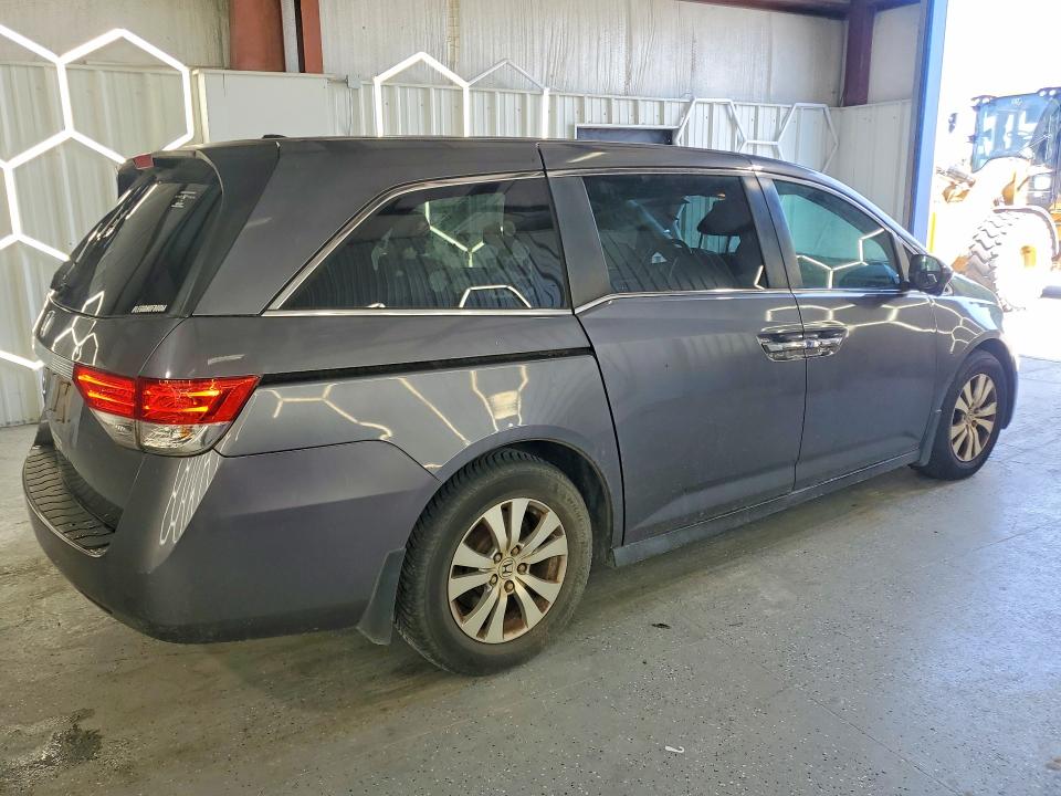 Photo 3 from auction – 2016 HONDA ODYSSEY with VIN 5FNRL5H60GB007031