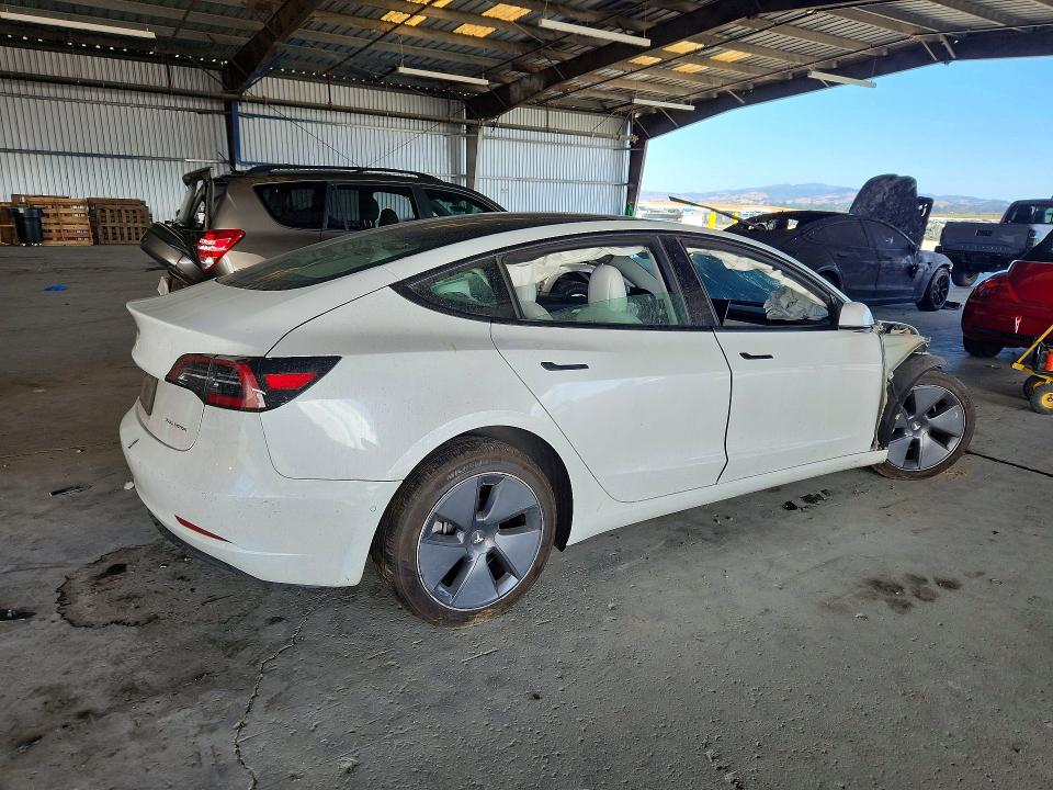 Photo 3 from auction – 2022 TESLA MODEL 3 with VIN 5YJ3E1EB0NF260339