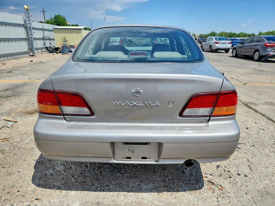 Photo 6 from auction – 1999 NISSAN MAXIMA with VIN JN1CA21D9XT821780