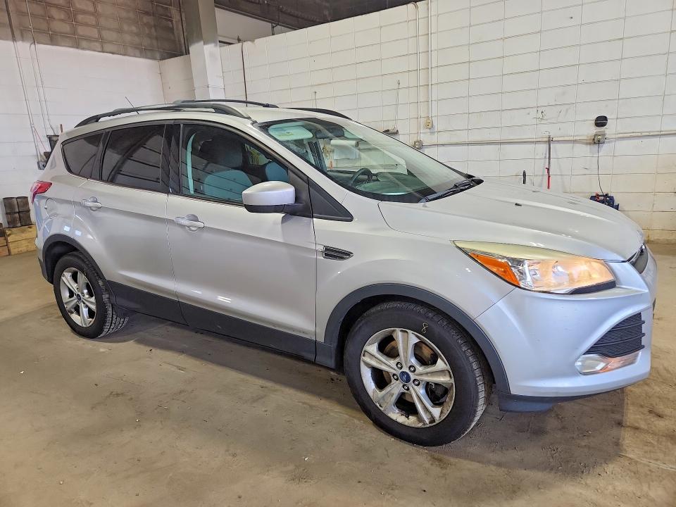 Photo 4 from auction – 2013 FORD ESCAPE with VIN 1FMCU9G90DUD10296