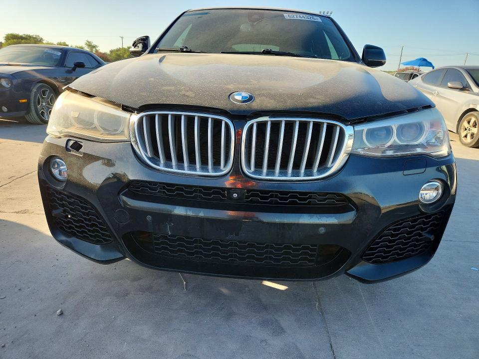 Photo 5 from auction – 2016 BMW X4 with VIN 5UXXW5C58G0N92953