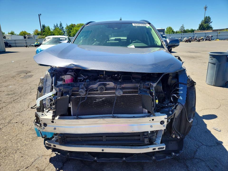 Photo 5 from auction – 2023 TOYOTA RAV4 with VIN JTMD6RFV3PD103472