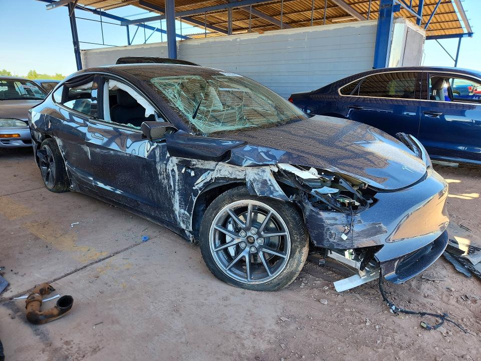 Photo 4 from auction – 2022 TESLA MODEL 3 with VIN 5YJ3E1EB7NF138383