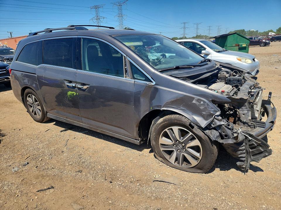 Photo 4 from auction – 2014 HONDA ODYSSEY with VIN 5FNRL5H93EB026292