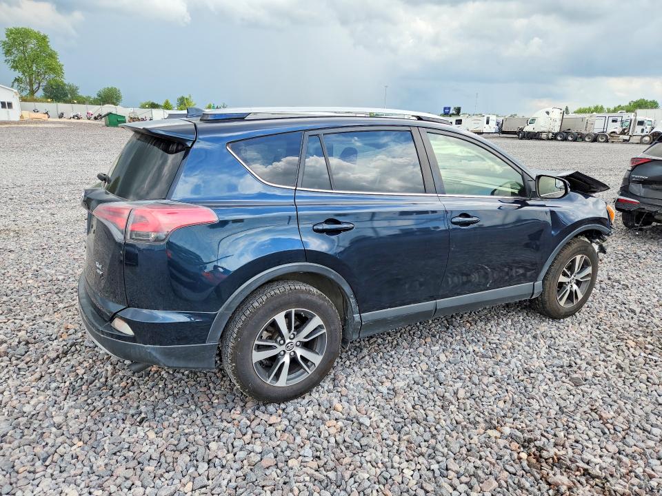 Photo 3 from auction – 2017 TOYOTA RAV4 with VIN JTMRFREV1HJ130812