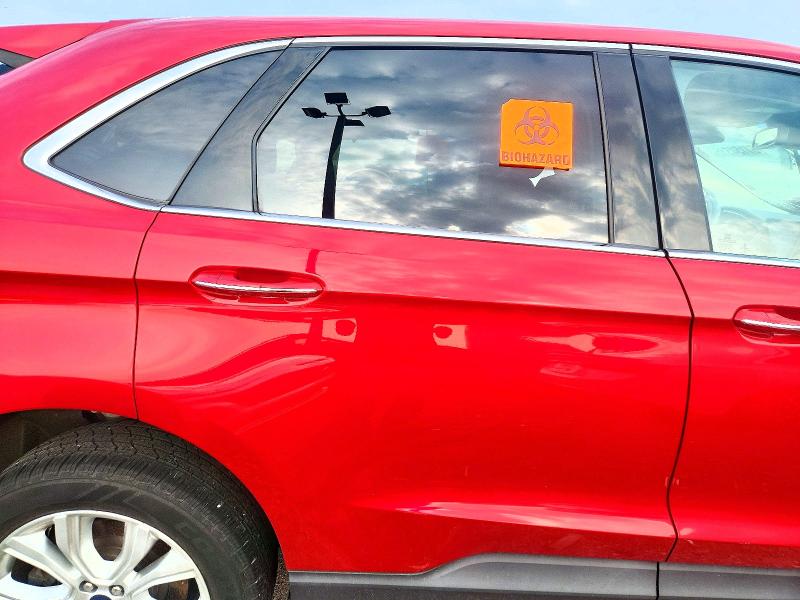 Photo 11 from auction – 2021 FORD EDGE with VIN 2FMPK4K98MBA59969
