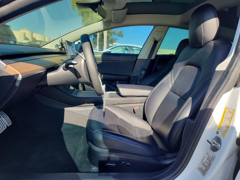 Photo 7 from auction – 2021 TESLA MODEL 3 with VIN 5YJ3E1EC4MF876245