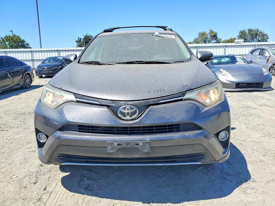 Photo 5 from auction – 2018 TOYOTA RAV4 with VIN 2T3RFREV8JW851653