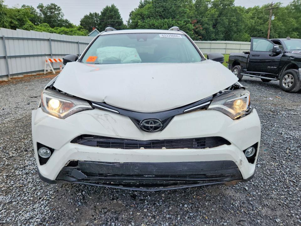 Photo 5 from auction – 2018 TOYOTA RAV4 with VIN JTMBFREV3JJ244334