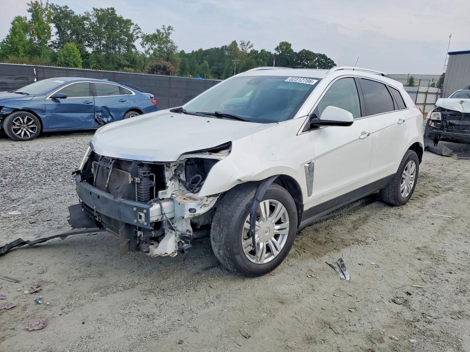 CADILLAC SRX 2014 with VIN 3GYFNBE30ES660611 - Photo from auction