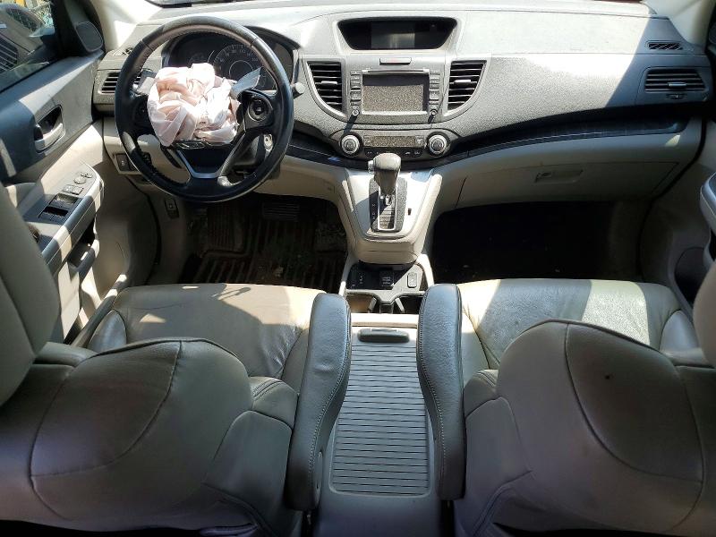 Photo 8 from auction – 2014 HONDA CR-V with VIN 2HKRM4H94EH104331