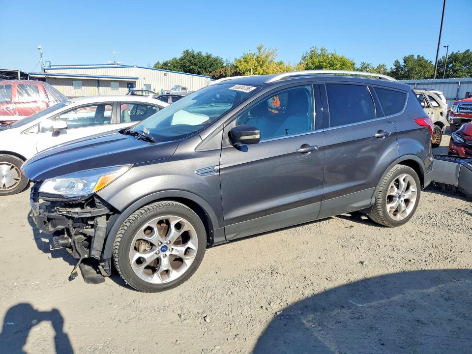 FORD ESCAPE 2015 with VIN 1FMCU0J92FUB31734 - Photo from auction