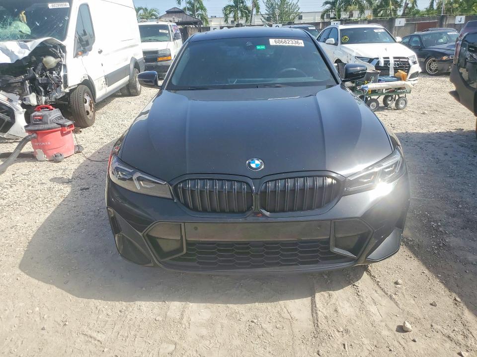 Photo 5 from auction – 2023 BMW 330I with VIN 3MW69FF08P8C91855