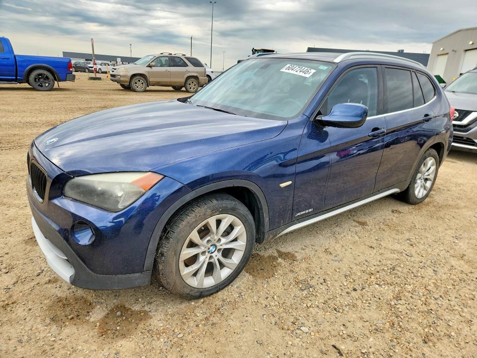 BMW X1 2012 with VIN WBAVL1C56CVR77240 - Photo from auction