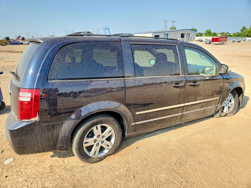 Photo 3 from auction – 2010 DODGE GRAND CARAVAN with VIN 2D4RN6DX5AR336420