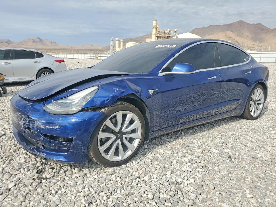 TESLA MODEL 3 2018 with VIN 5YJ3E1EA2JF038399 - Photo from auction