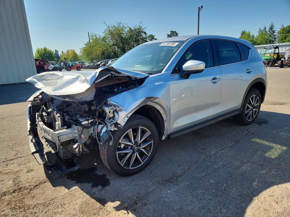 MAZDA CX-5 2018 with VIN JM3KFADM2J1353823 - Photo from auction
