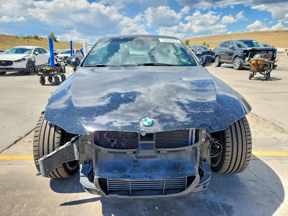Photo 5 from auction – 2011 BMW 335 with VIN WBADX7C57BE580640