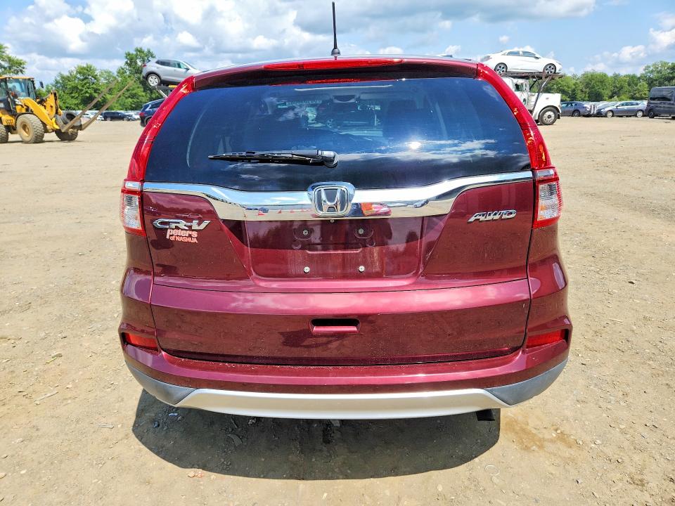 Photo 6 from auction – 2015 HONDA CR-V with VIN 2HKRM4H57FH680333