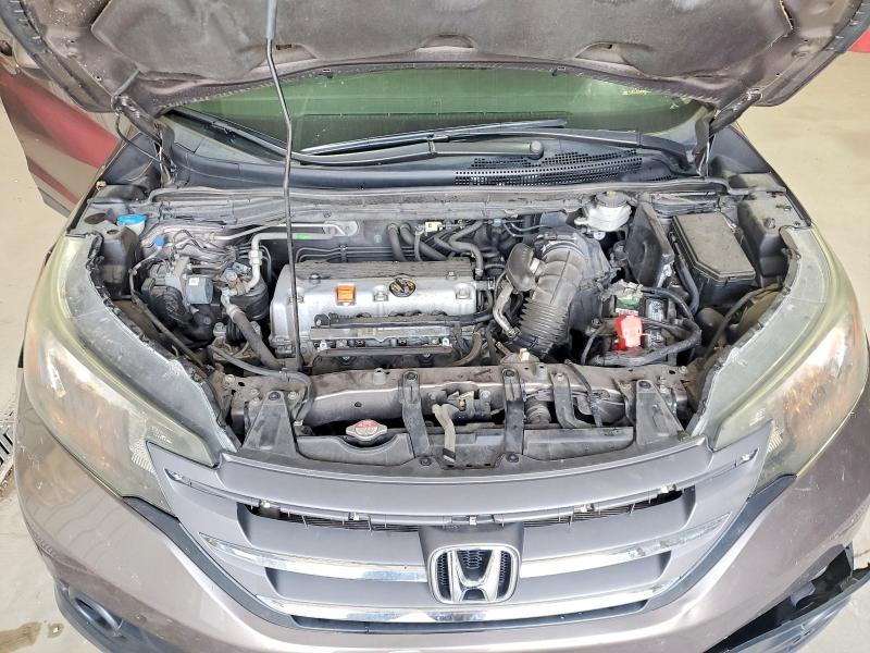 Photo 12 from auction – 2013 HONDA CR-V with VIN 5J6RM4H7XDL077168