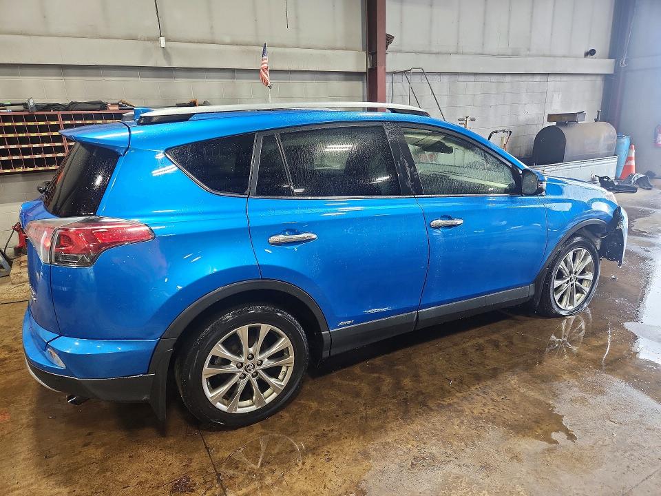 Photo 3 from auction – 2018 TOYOTA RAV4 HV with VIN JTMDJREV6JD165469