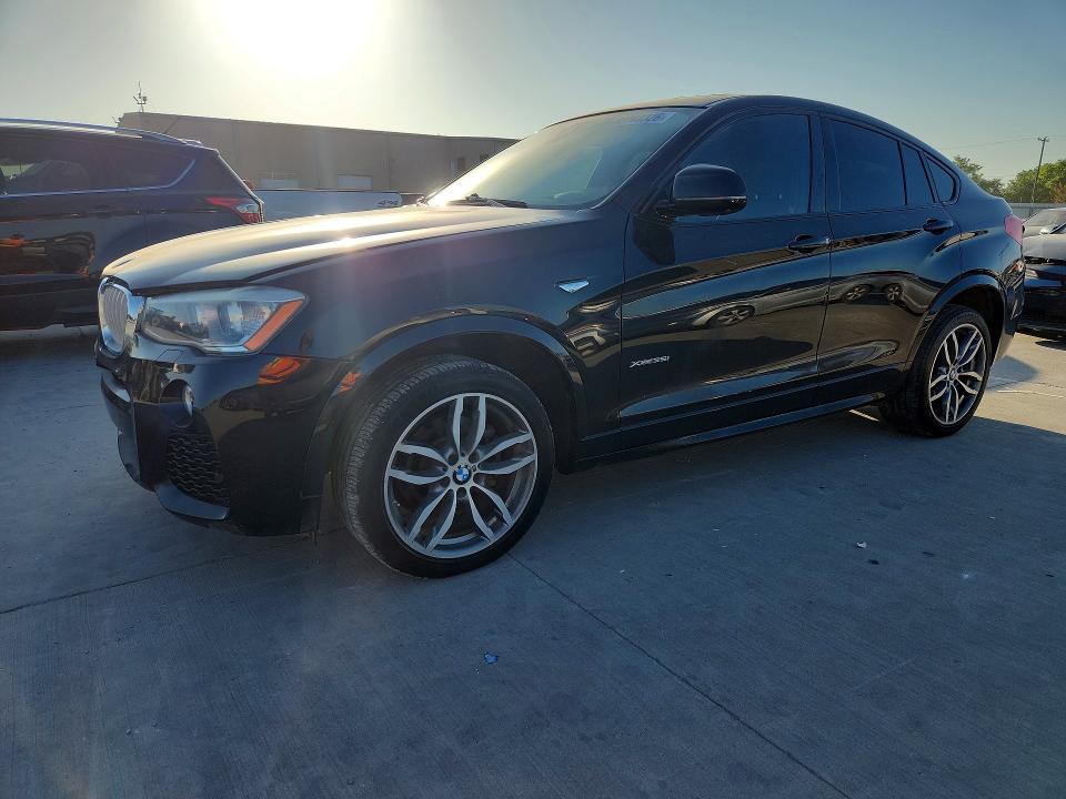 BMW X4 2016 with VIN 5UXXW5C58G0N92953 - Photo from auction