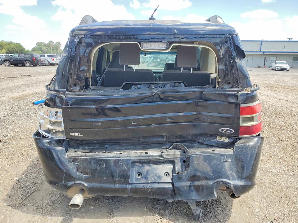 Фото 6 с аукциона – 2016 FORD FLEX с VIN 2FMGK5C89GBA01871