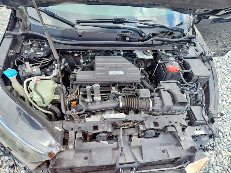 Photo 11 from auction – 2018 HONDA CR-V with VIN 7FARW1H51JE040459