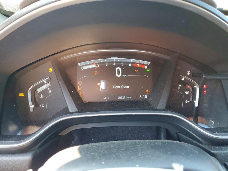 Photo 9 from auction – 2018 HONDA CR-V with VIN 7FARW2H81JE062011