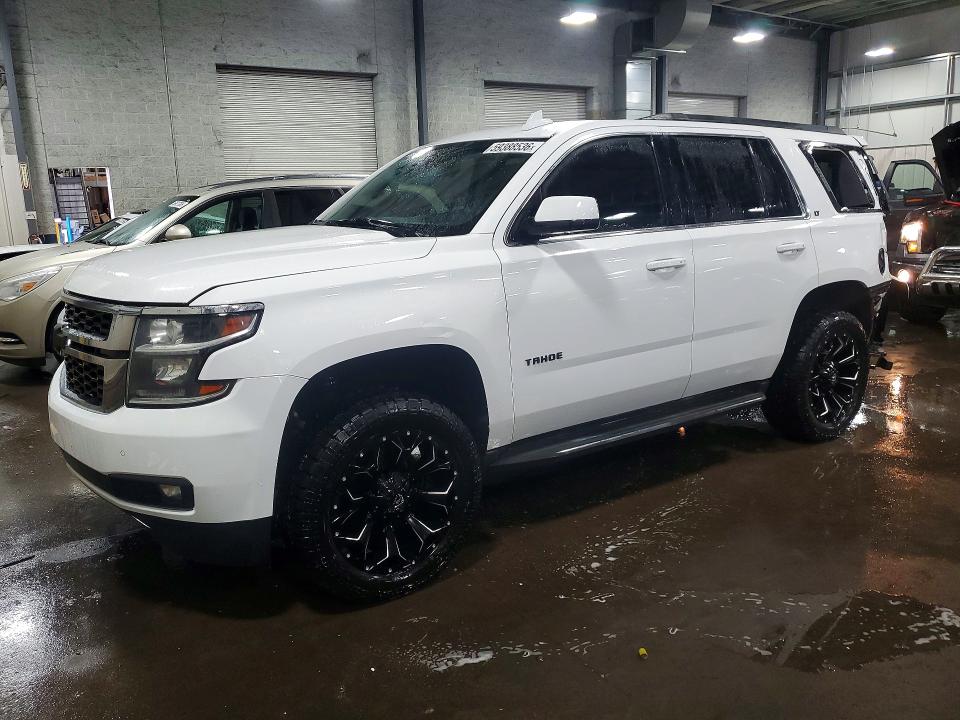 CHEVROLET TAHOE 2015 with VIN 1GNSKBKC6FR572028 - Photo from auction
