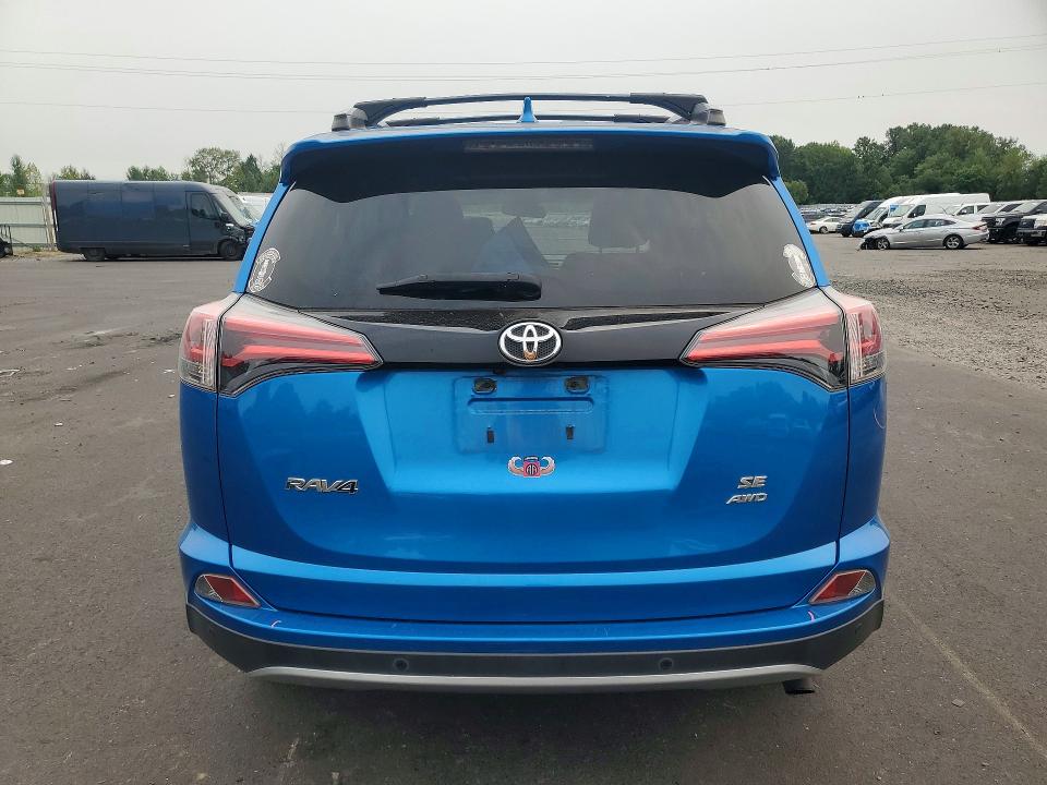 Photo 6 from auction – 2017 TOYOTA RAV4 with VIN JTMJFREV4HJ129313