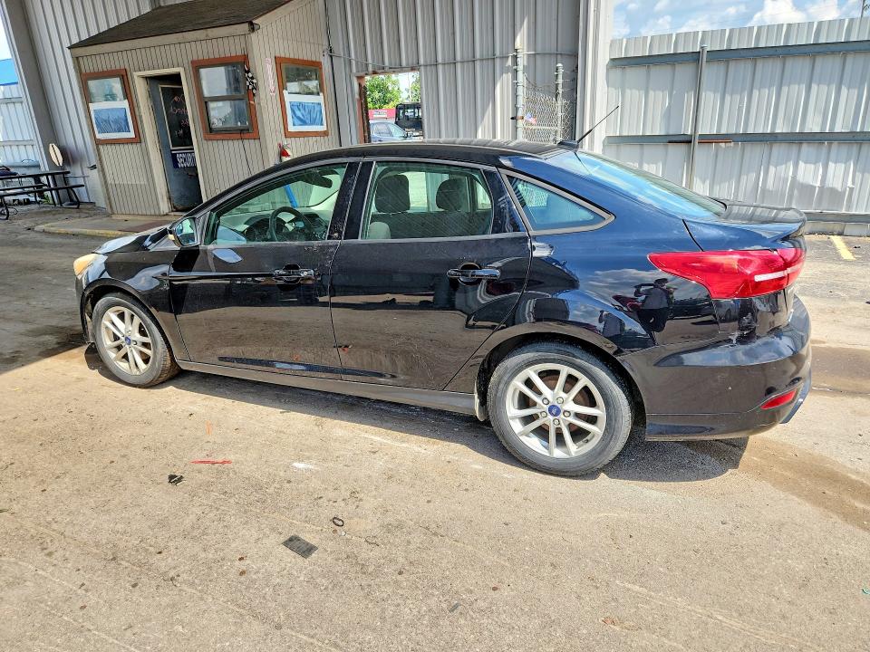 Photo 2 from auction – 2016 FORD FOCUS with VIN 1FADP3F25GL337558
