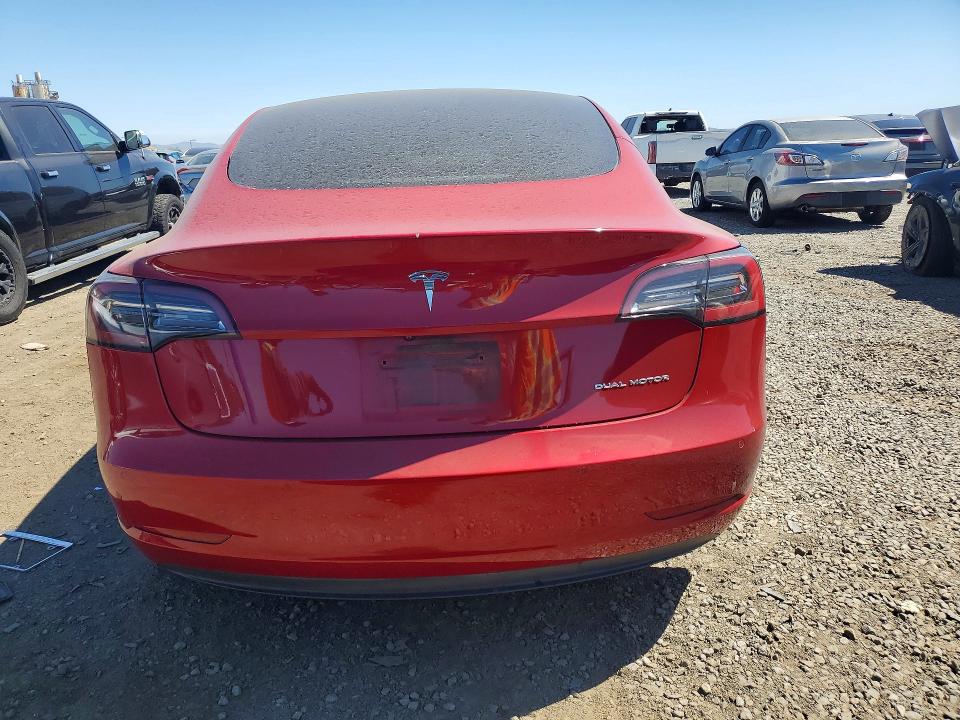 Photo 6 from auction – 2022 TESLA MODEL 3 with VIN 5YJ3E1EB0NF144641