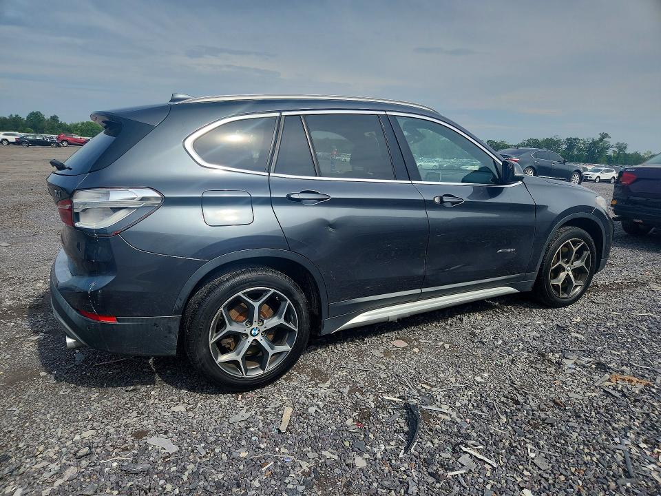 Photo 3 from auction – 2017 BMW X1 with VIN WBXHT3C33H5F72590