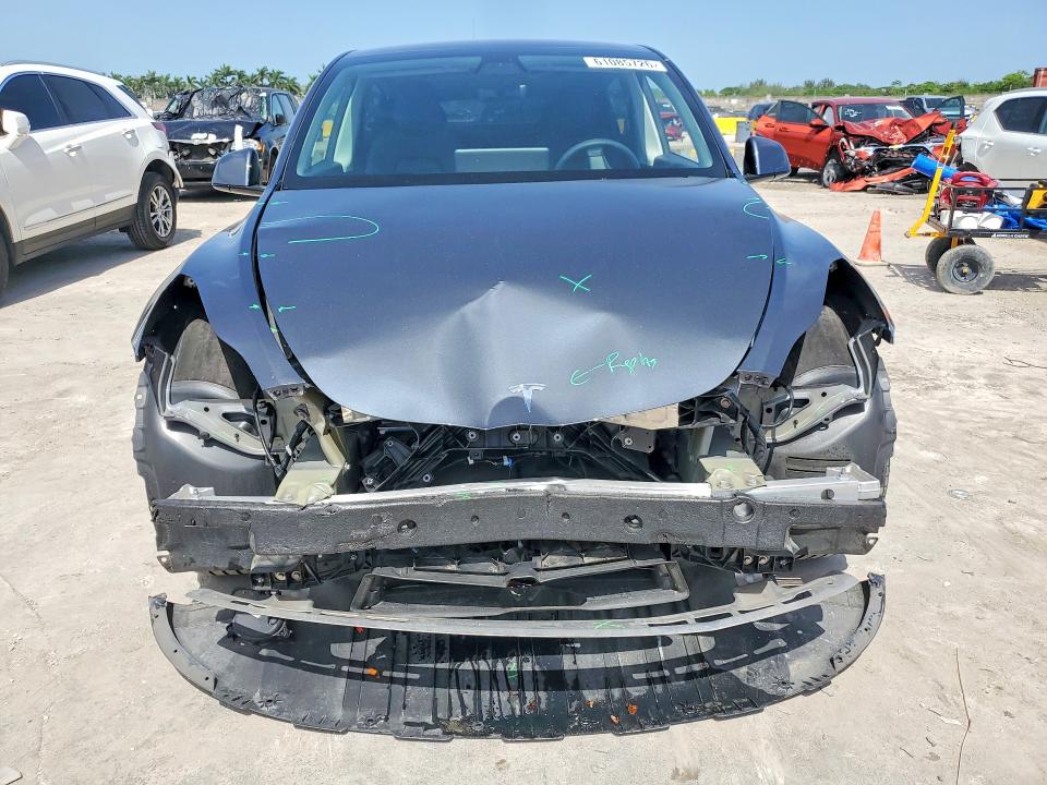 Снимка 5 от търг – 2022 TESLA MODEL Y с VIN 7SAYGDEF2NF358005
