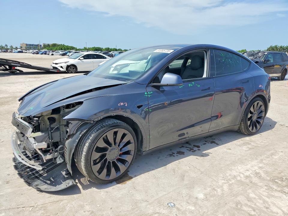 TESLA MODEL Y 2022 с VIN 7SAYGDEF2NF358005 - Снимка от търг