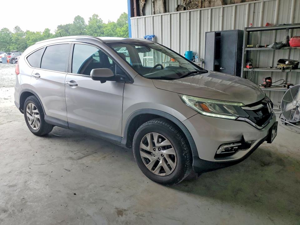 Photo 4 from auction – 2016 HONDA CR-V with VIN 2HKRM3H71GH500034