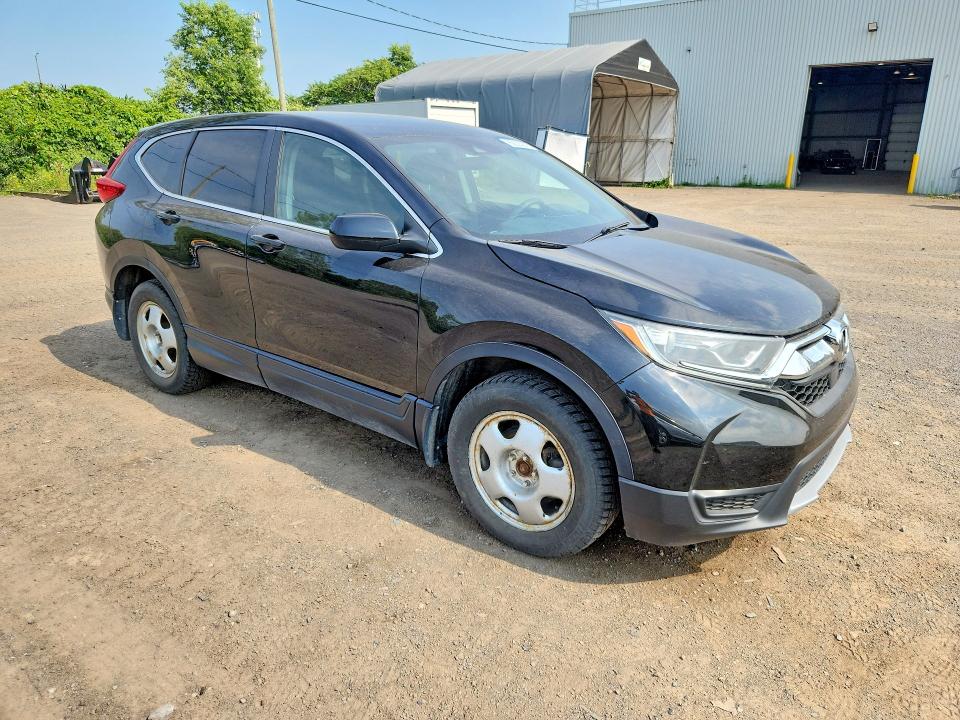 Photo 4 from auction – 2018 HONDA CR-V with VIN 2HKRW2H25JH138581