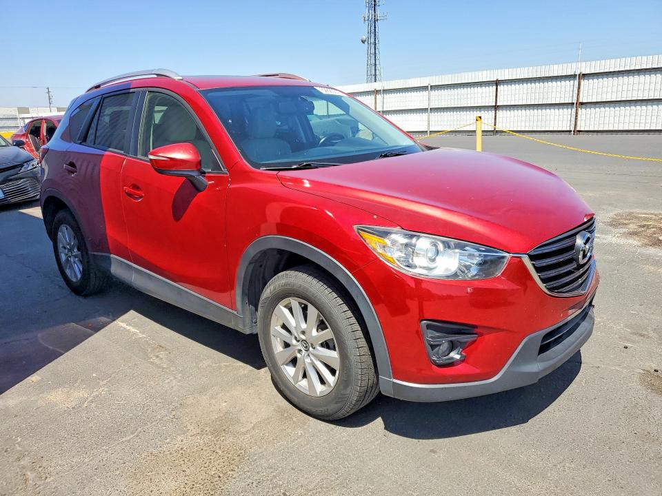 Photo 4 from auction – 2016 MAZDA CX-5 with VIN JM3KE2CY8G0626792