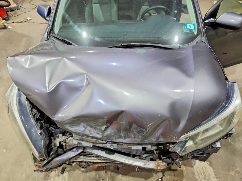 Photo 12 from auction – 2015 HONDA CR-V with VIN 5J6RM4H55FL084000