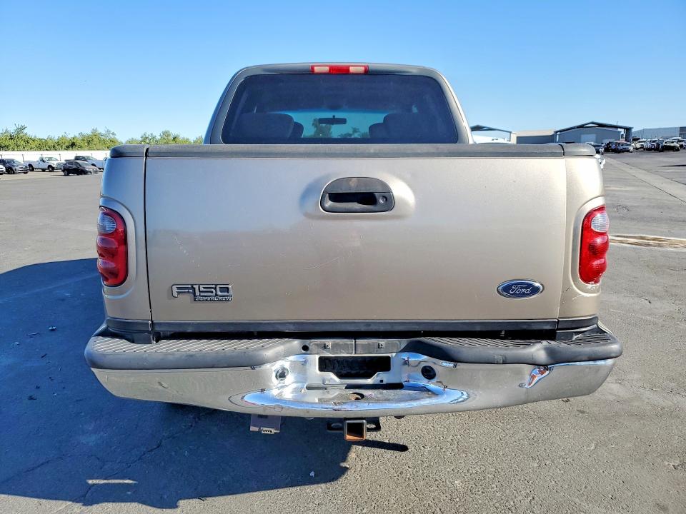 Photo 6 from auction – 2002 FORD F150 with VIN 1FTRW07652KA66440