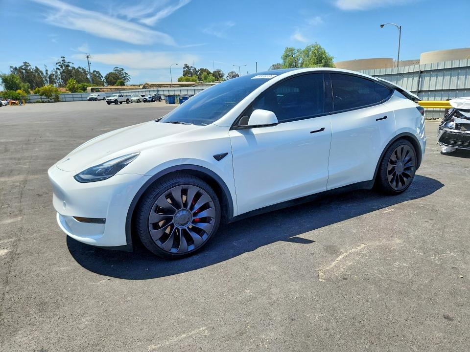 TESLA MODEL Y 2023 with VIN 7SAYGDEF2PF942827 - Photo from auction